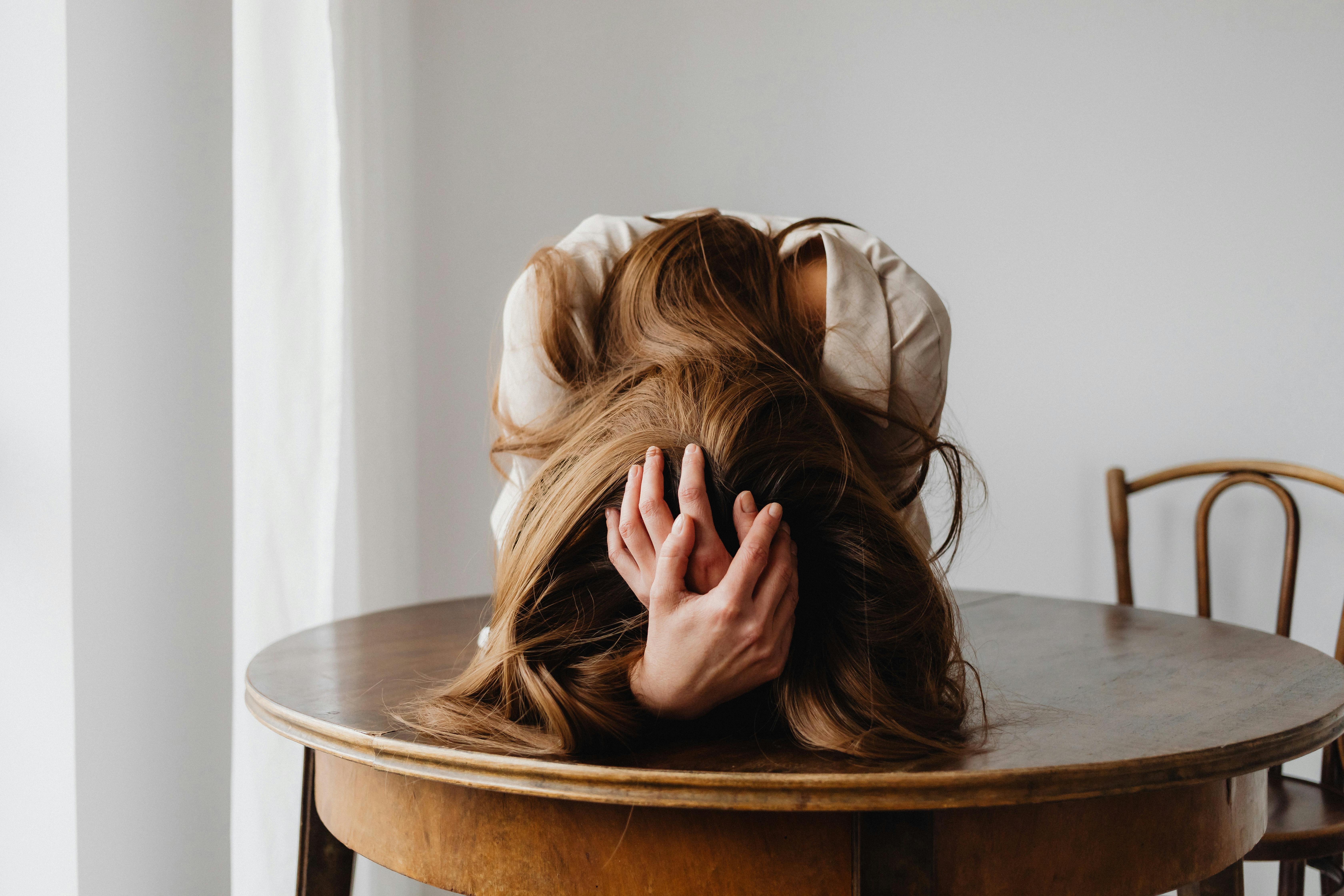 Woman experiencing emotional distress, representing CPTSD emotional flashbacks in neurodivergent adults